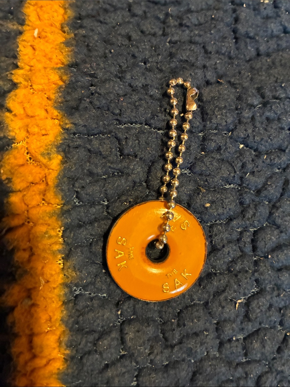 The Sak Orange Enamel Donut Charm Key Tag